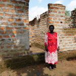 woman sells bricks and donuts in Kenya