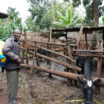dairy farmer in Kenya purchased sprayer with savings and loan