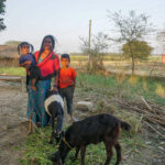 woman buying goat for her farm in Nepal