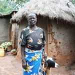 woman investing her money in goats in Kenya
