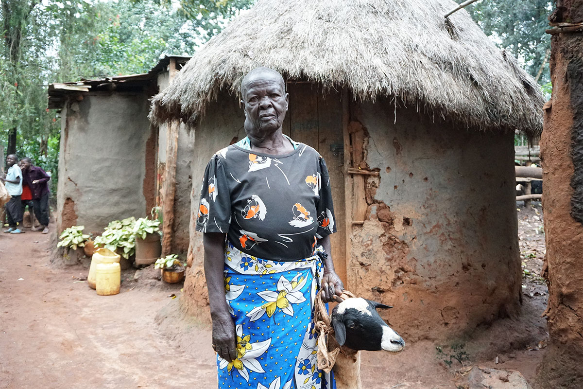 woman investing her money in goats in Kenya