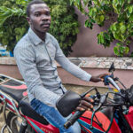 savings group member in Haiti buys motorcycle with savings