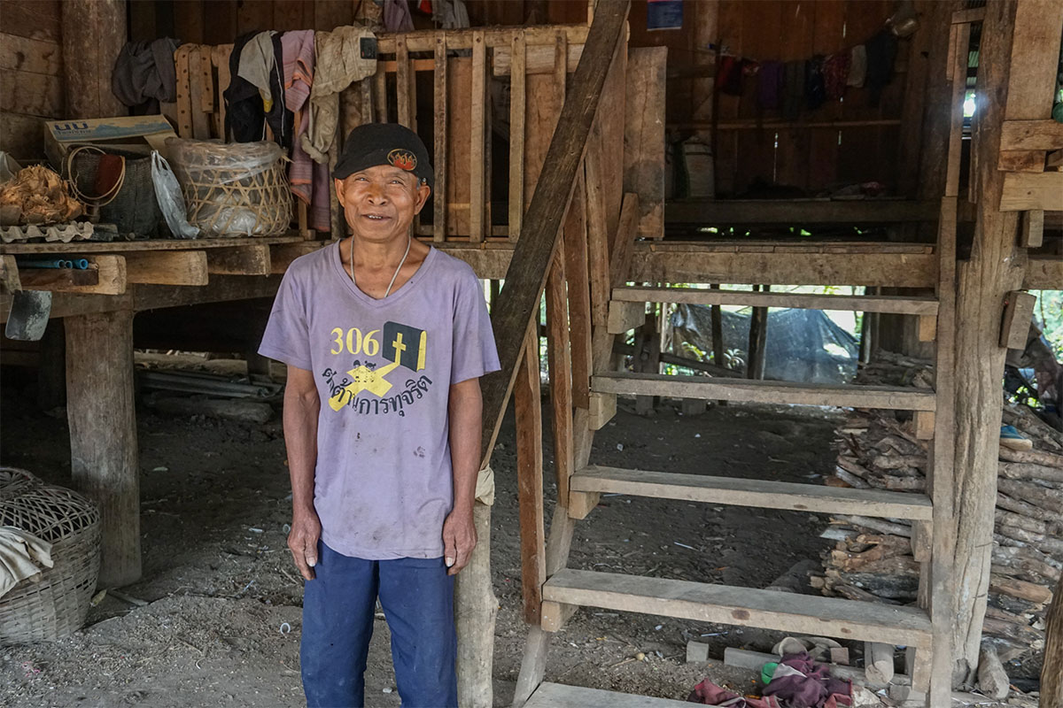 man saving to buy land in Thailand