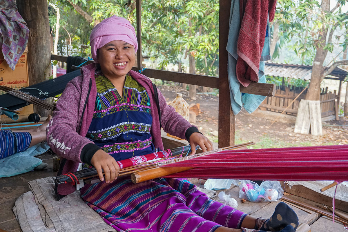 woman saving to buy yarn to make traditional bags